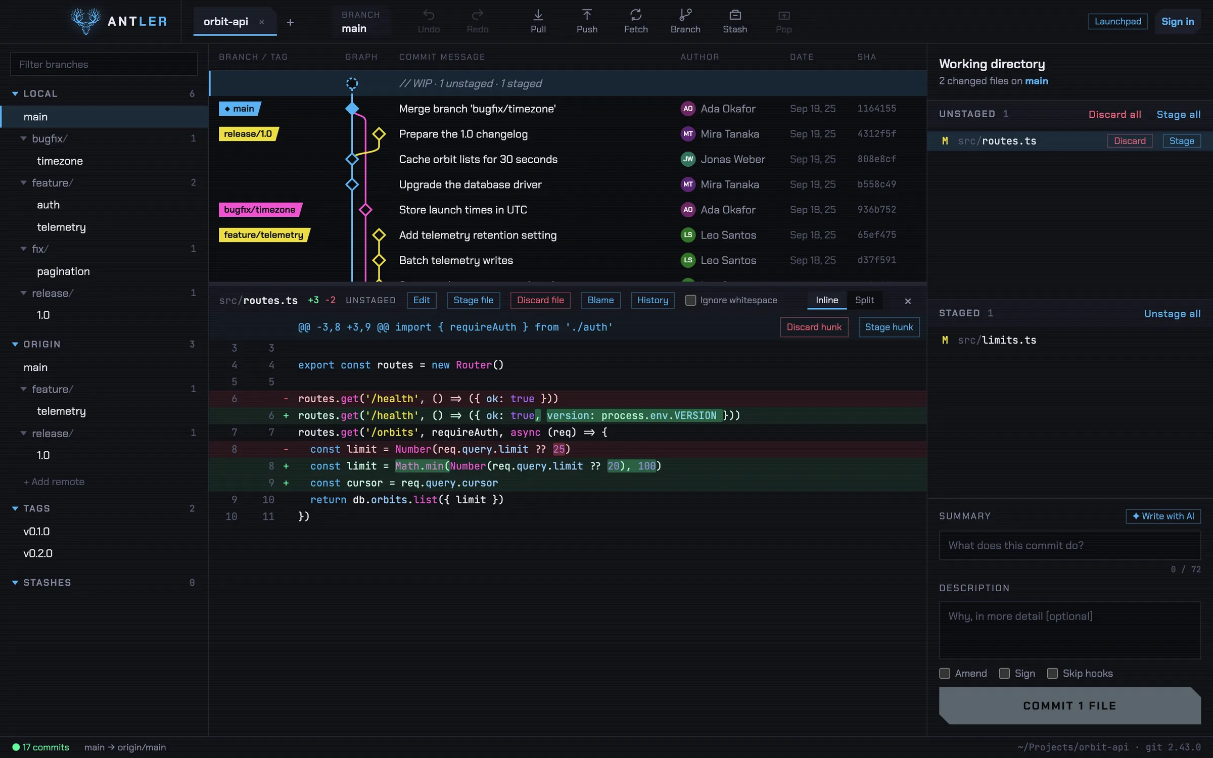 Antler with a project open: branches in the sidebar, the commit graph in sky blue, pink and yellow lanes, a diff with the changed words marked, and the commit box.